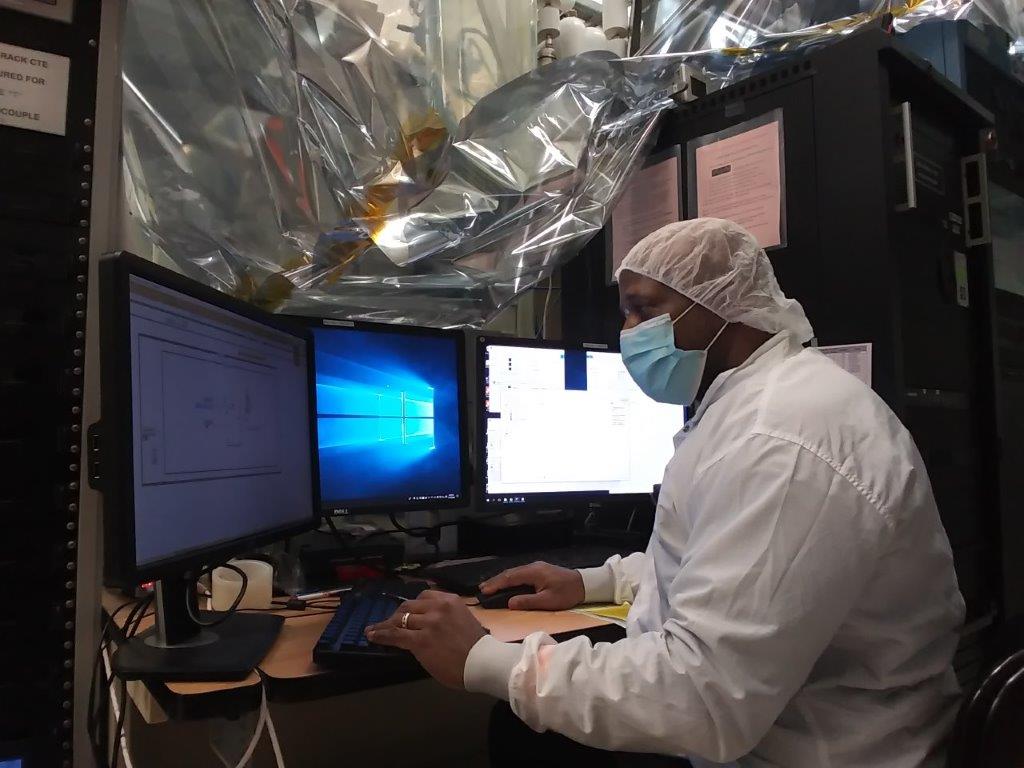 Daniel Bae, Carlos Morell Rodriguez, and the DraMS team working on MEB hardware in the T2D2 Facility.
